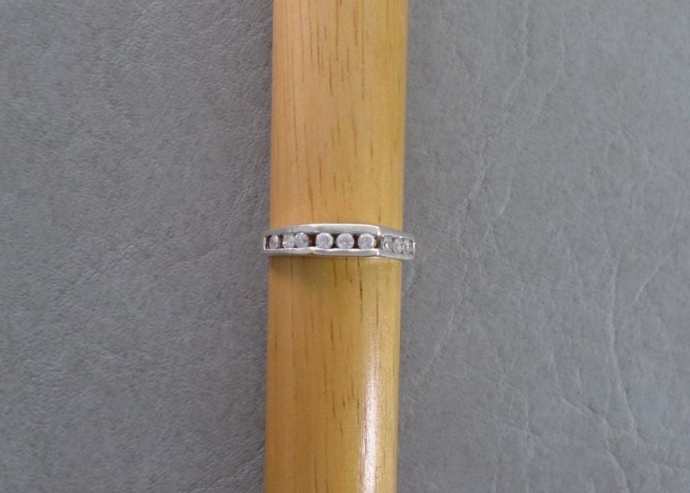 Sterling silver ring with an angled stone set feature