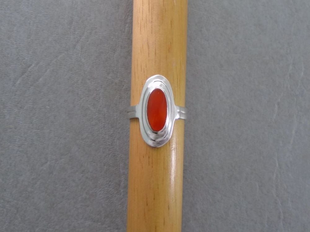 Layer effect sterling silver ring with orange inlay