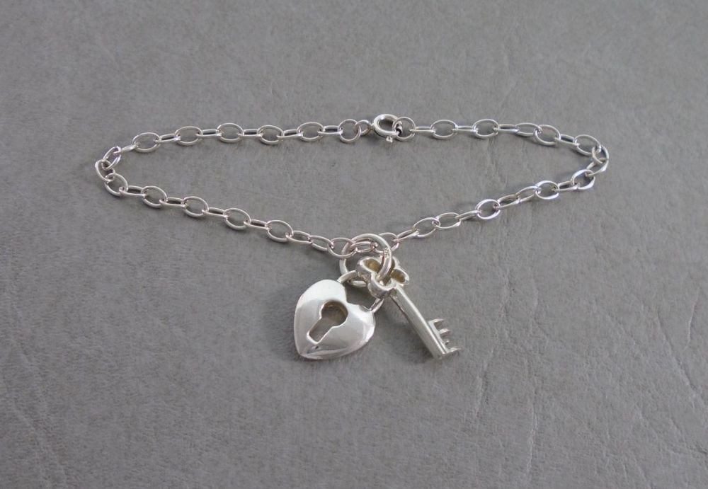 Sterling silver bracelet with lock & key charms