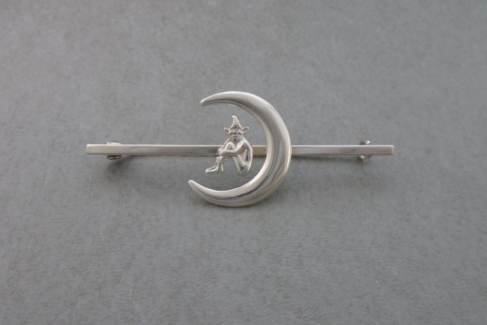 Sterling silver pixie in a moon brooch