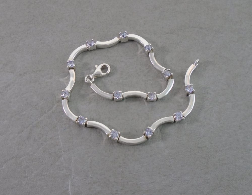 Wavy sterling silver & clear stone tennis bracelet