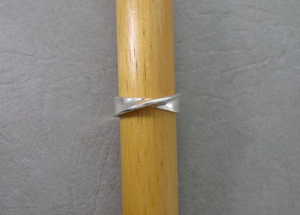 Simple solid sterling silver twist ring