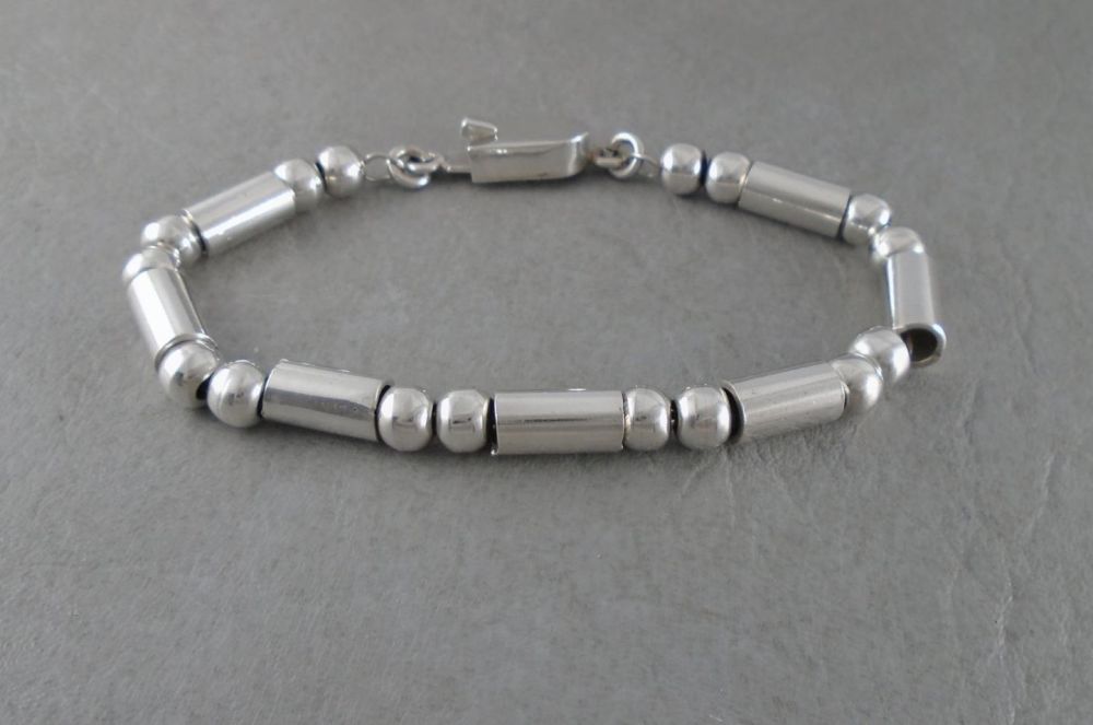 Heavy sterling silver tube & sphere bracelet