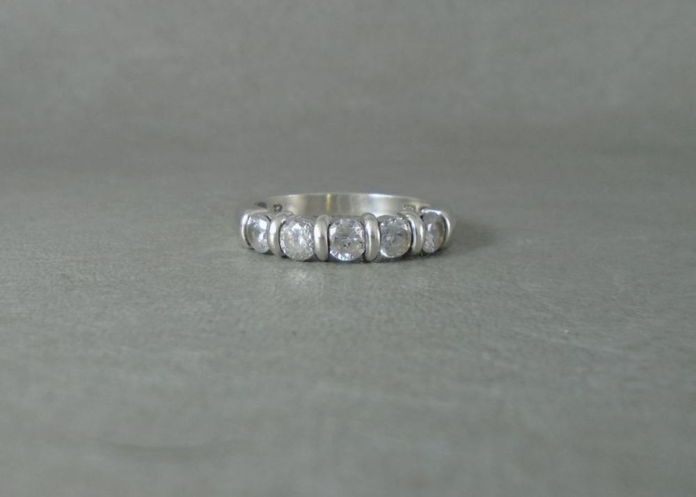 Sterling silver ring with 5 clear stones