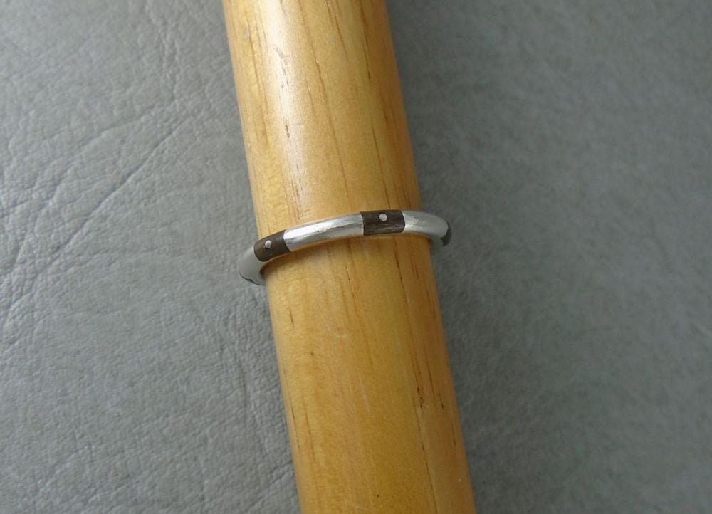 Unusual sterling silver ring with wooden inlay