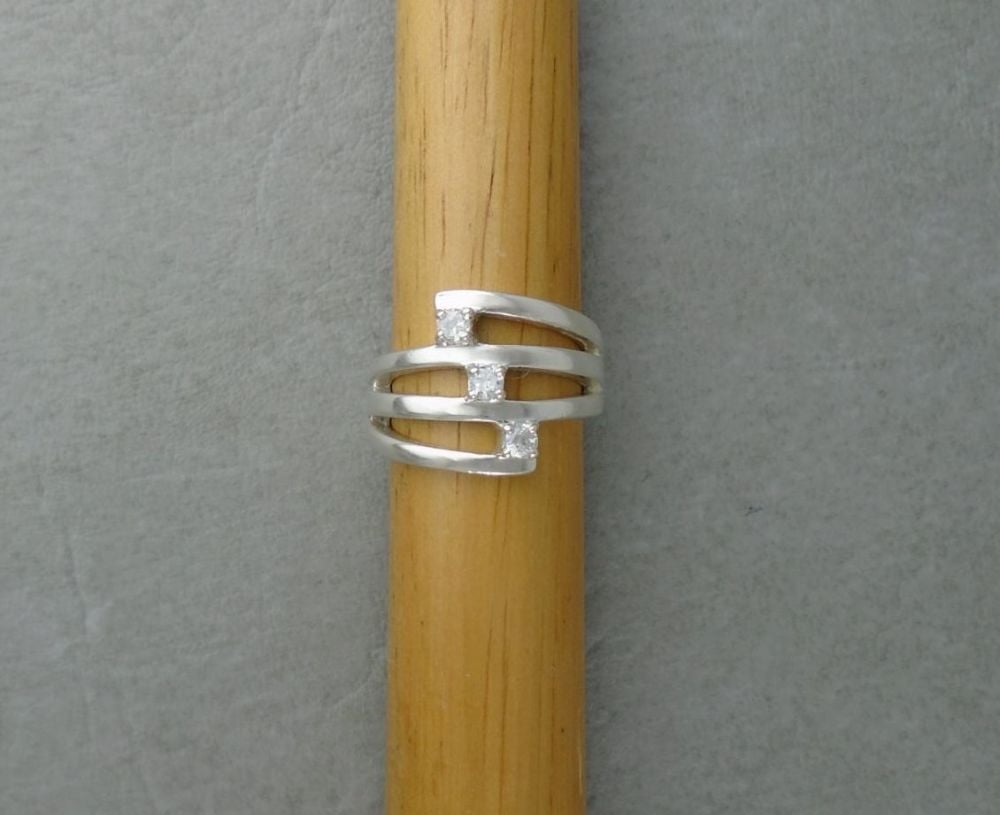 Sterling silver tri-band effect ring with clear stones