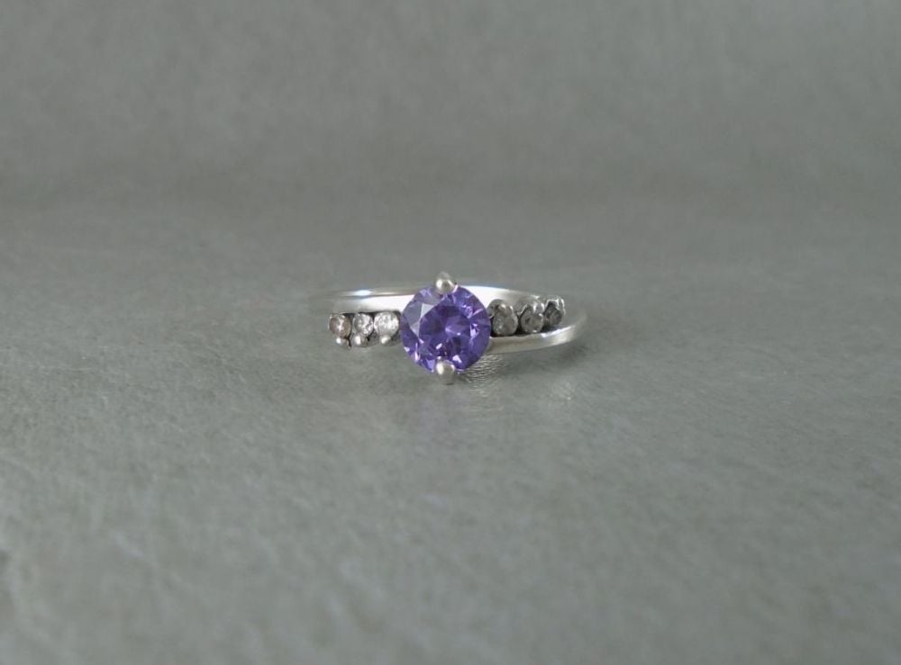 Sterling silver ring with purple & clear stones