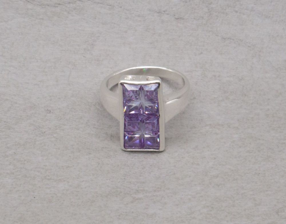 Wide sterling silver ring with 8 square amethyst glass stones