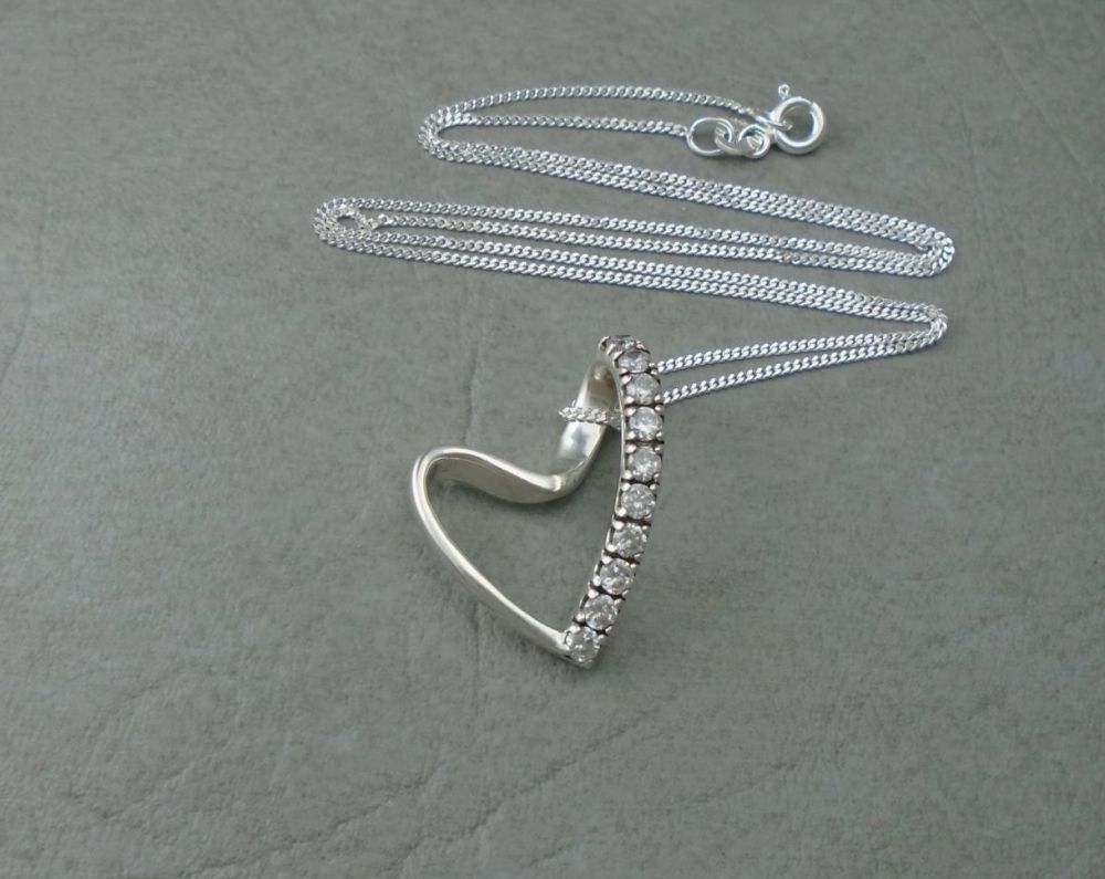 Sterling silver stone set floating heart necklace