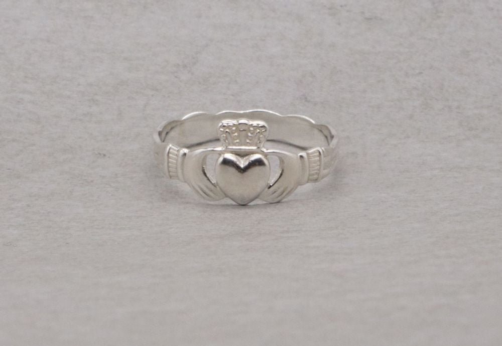 Sterling silver claddagh ring with a woven effect band