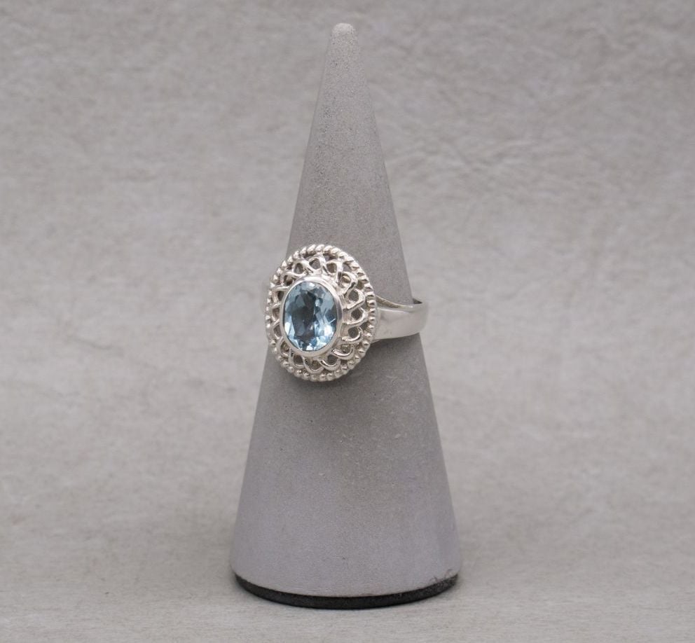 Elegant sterling silver & blue topaz cocktail ring