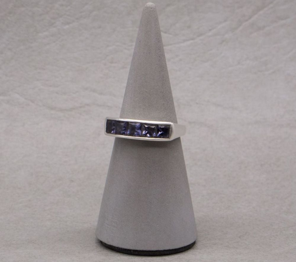 Sterling silver channel set amethyst ring, fancy mount