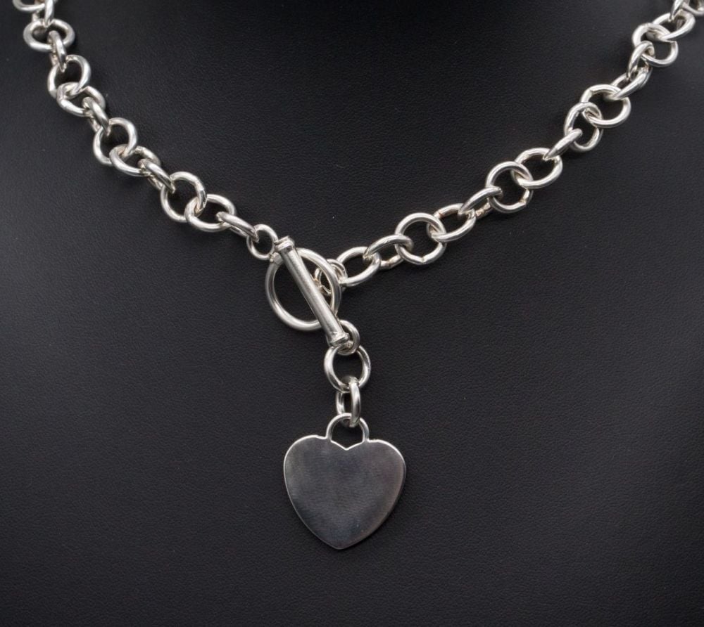 Heavy sterling silver toggle necklace with single solid heart tag