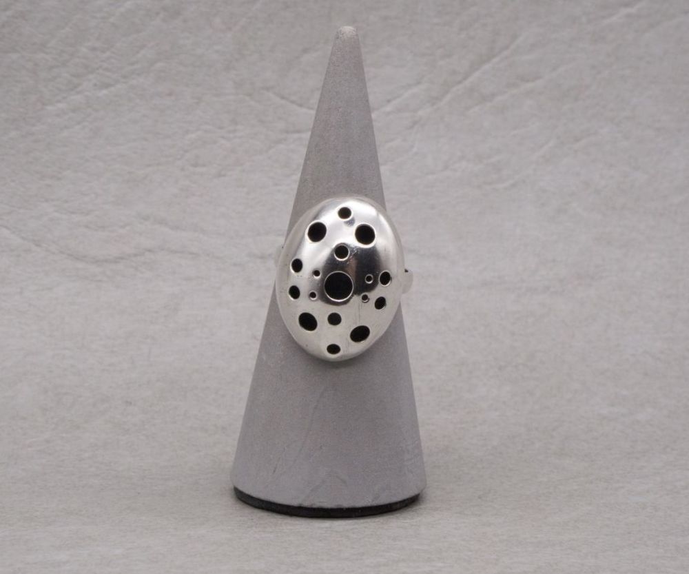 Unusual sterling silver holed dome ring