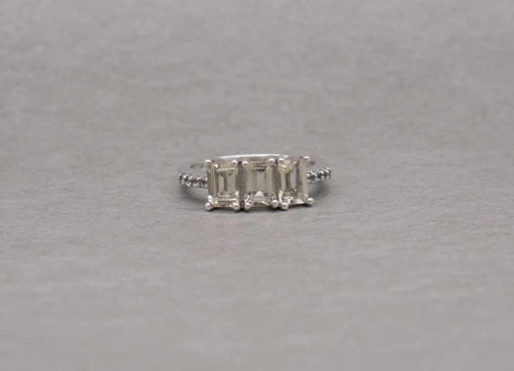 Rectangular sterling silver gem stone trilogy ring with accented shoulders