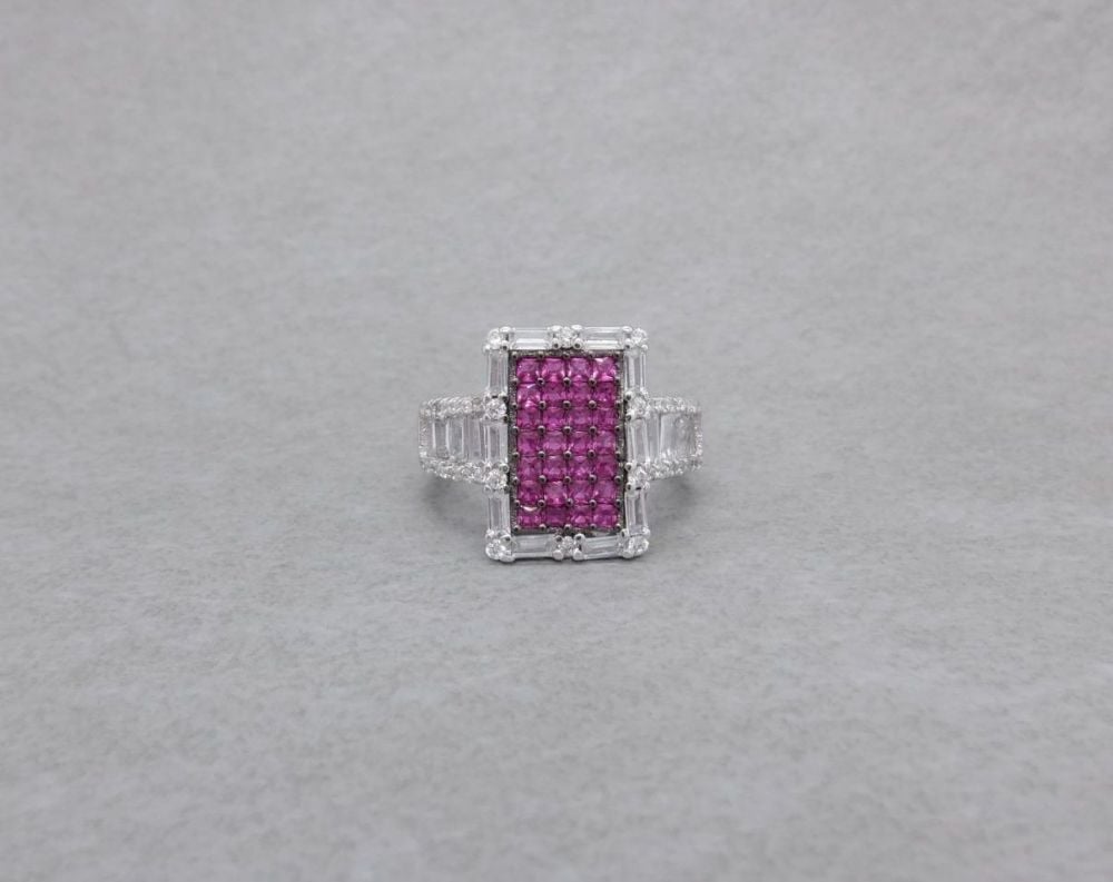 Unusual sterling silver ring with deep pink & clear stones