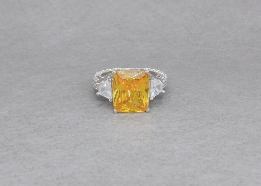 Sterling silver cocktail ring with yellow & clear stones