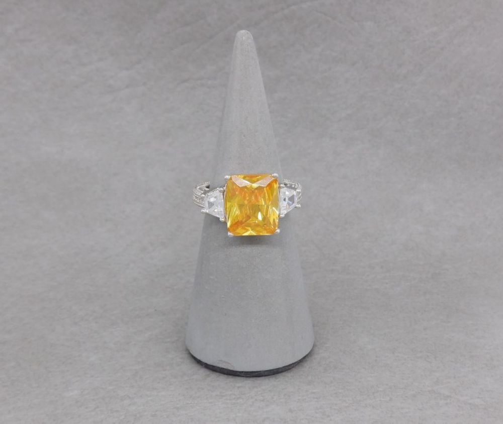 Chunky sterling silver cocktail ring with yellow & clear stones