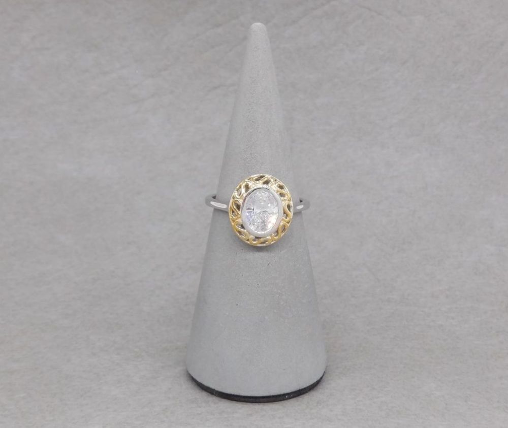 Sterling silver solitaire ring with gilt scroll frame