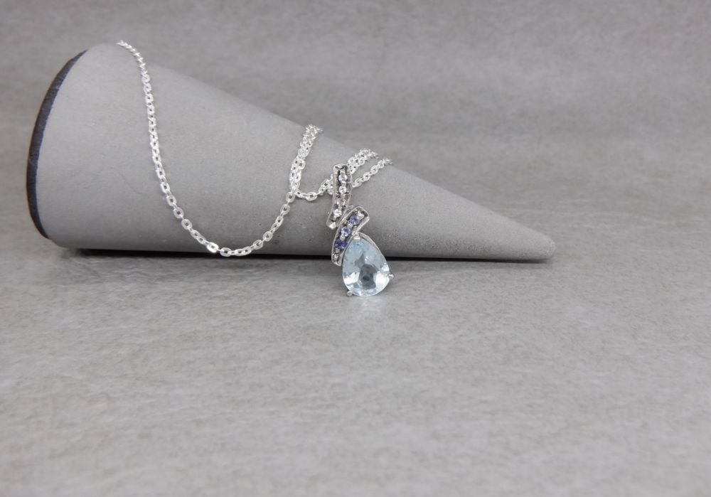 Sterling silver necklace with a small fancy stoned pendant