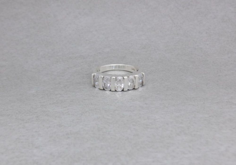 Sterling silver ring with 5 clear oval stones