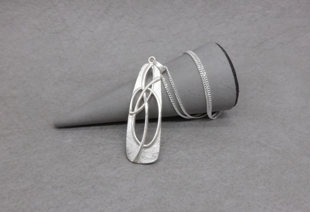 Attractive sterling silver abstract necklace