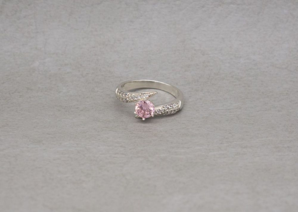 Sterling silver bypass ring with pink & clear stones
