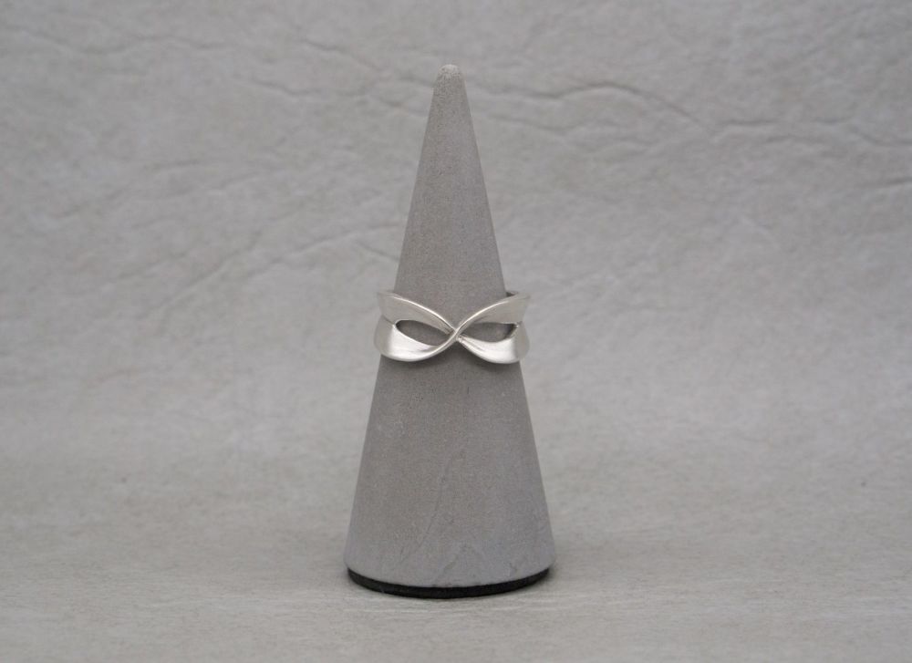 Unusual sterling silver shaped cross ring with textured detail