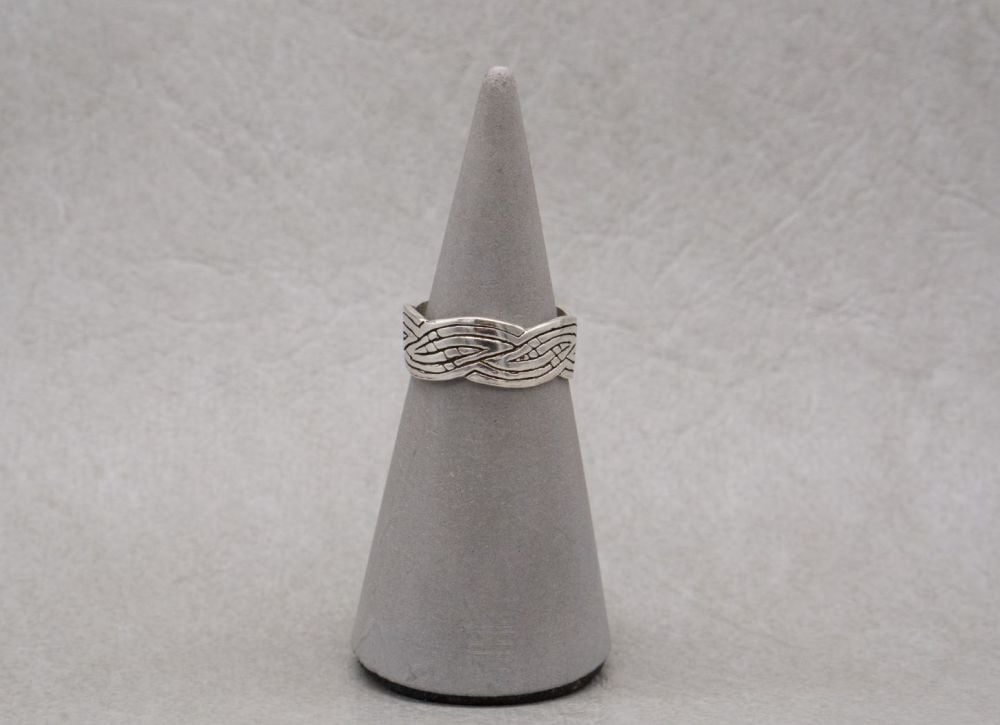 Adjustable sterling silver thumb ring with an oxidised wavy design