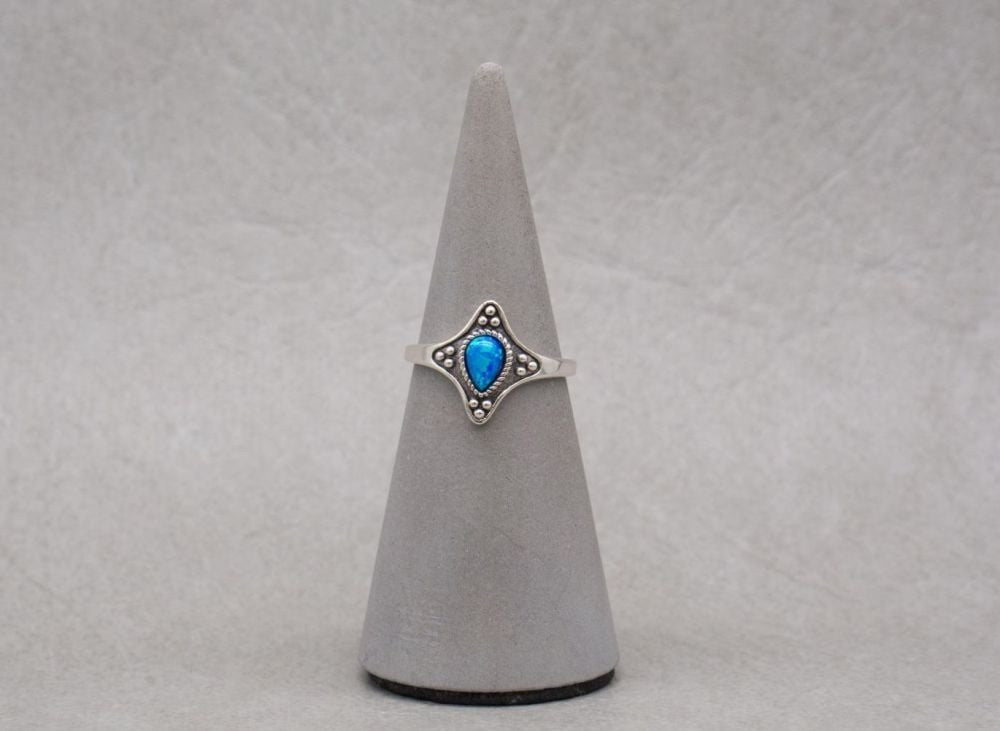 Unusual sterling silver & imitation blue opal ring