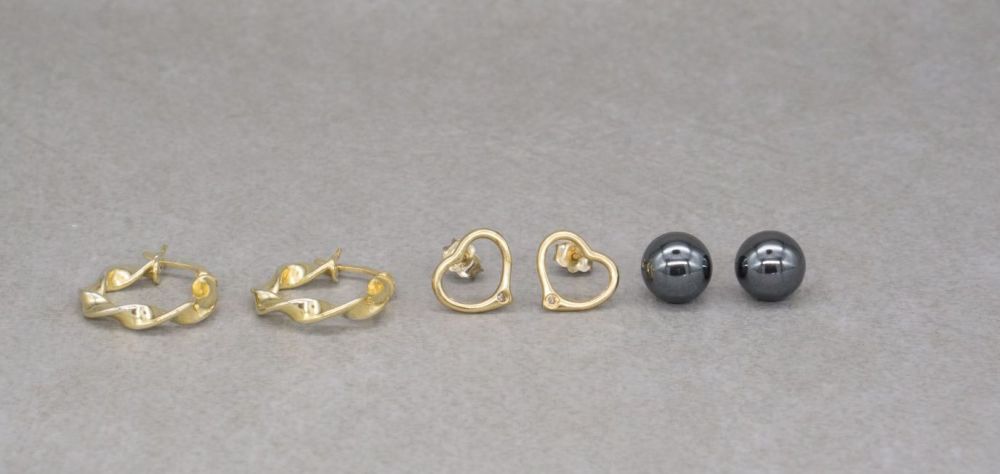 3 pairs of gilt sterling silver earrings; twist hoops, hematite sphere & op