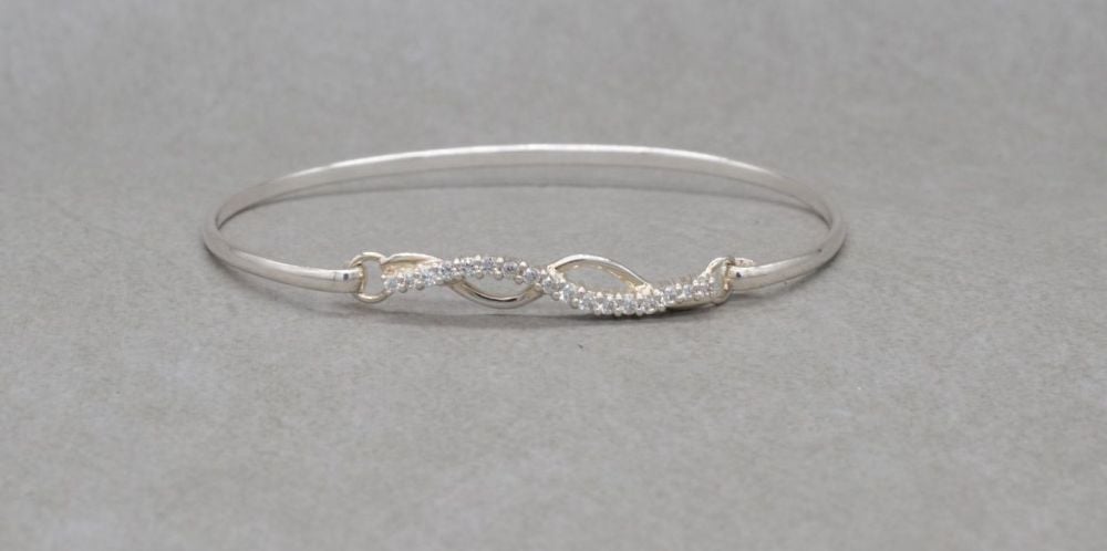 Sterling silver bangle with a stoned wave