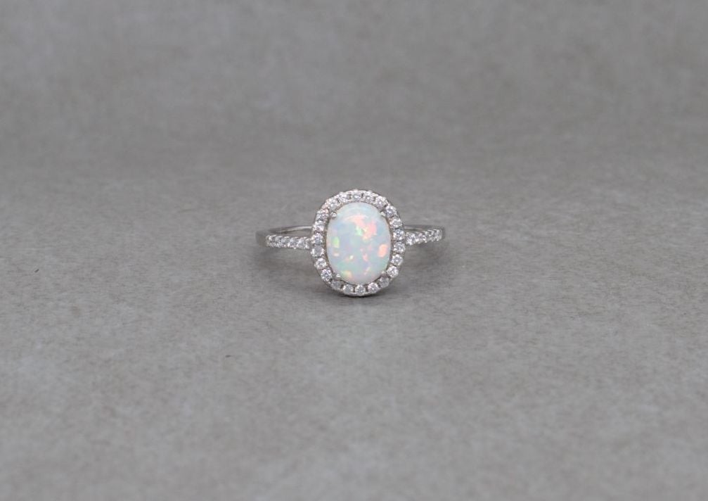Sterling silver & imitation opal solitaire ring with accents