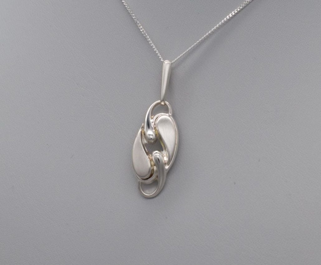 Sterling silver coffee bean necklace with brushed texture accents