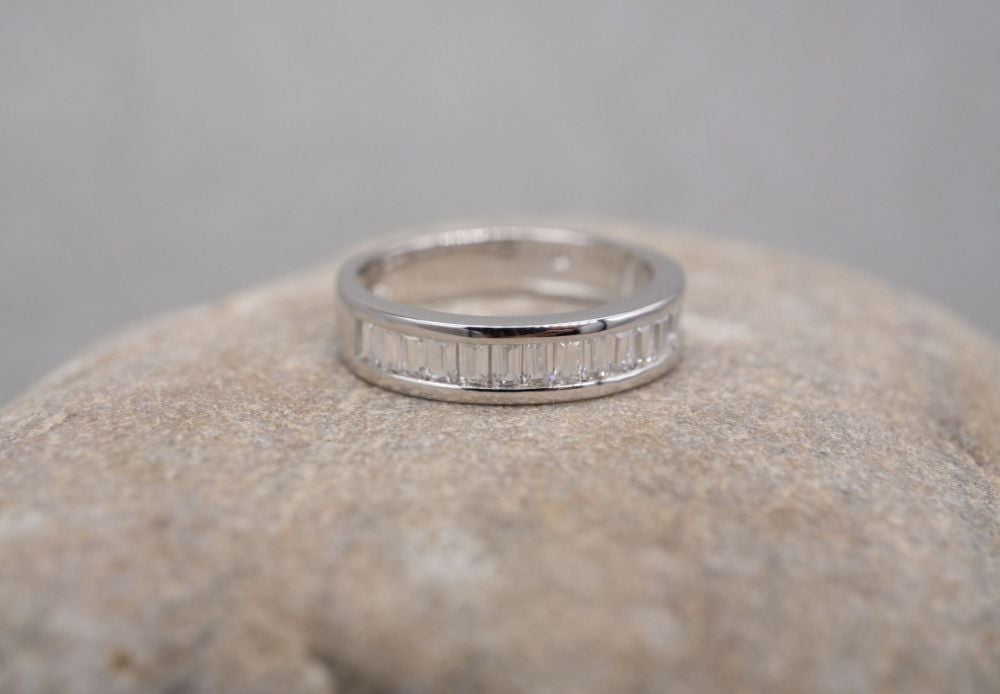 Sterling silver half eternity ring with clear baguette stones