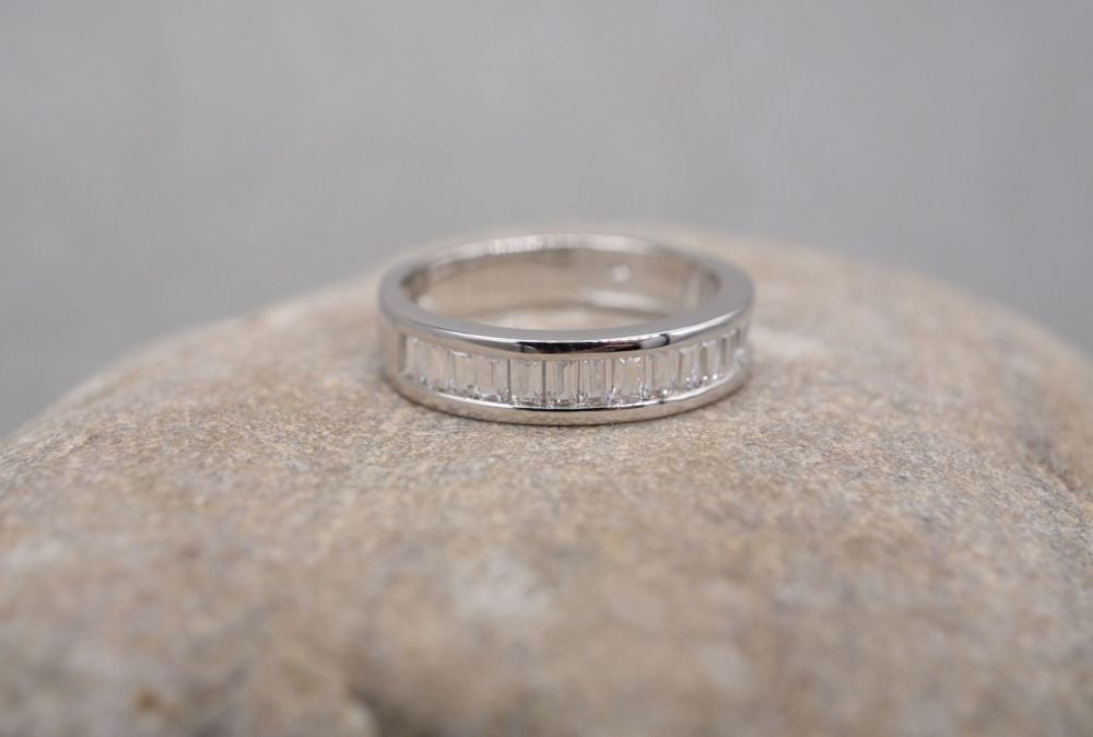 Sterling silver half eternity ring with clear baguette stones