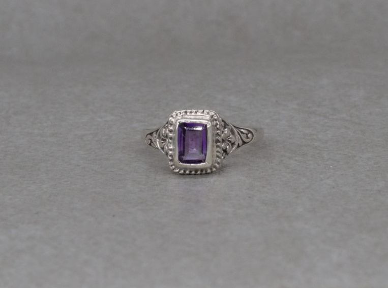 Sterling silver & amethyst ring with a floral mount