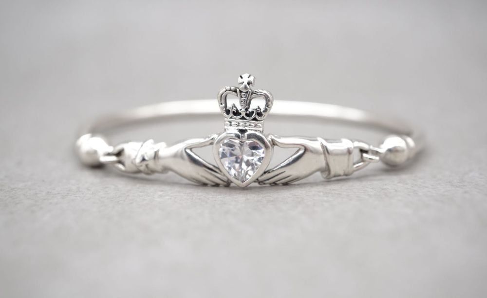 Sterling silver claddagh bangle with a clear stone heart