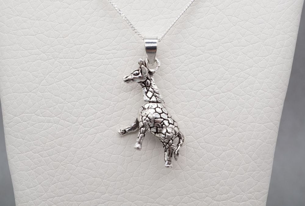 Unusual sterling silver articulated giraffe necklace
