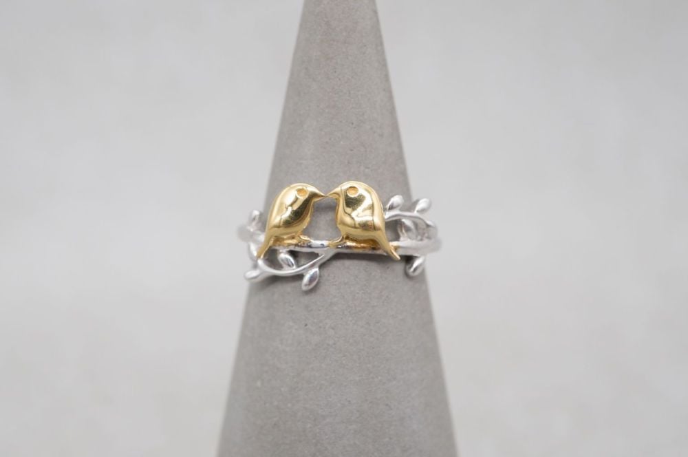 Cute sterling silver ring with two golden birds