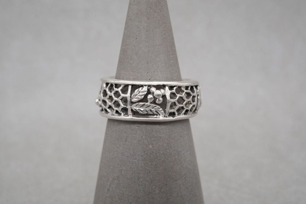 Handmade sterling silver ring with floral & honeycomb detail
