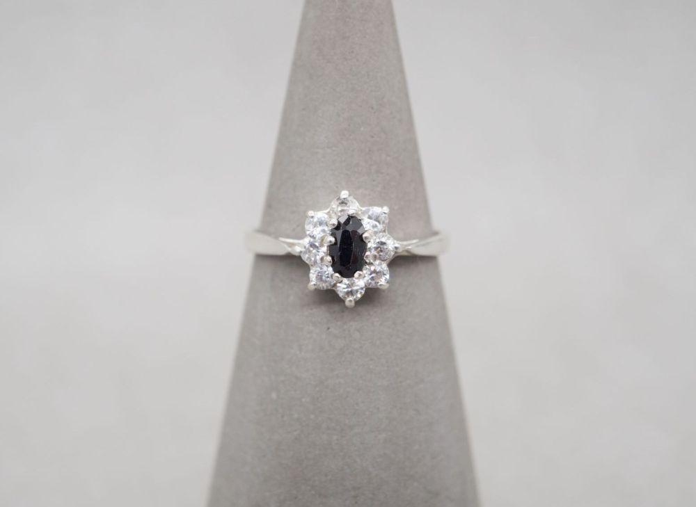 Vintage sterling silver cluster ring with blue & clear stones