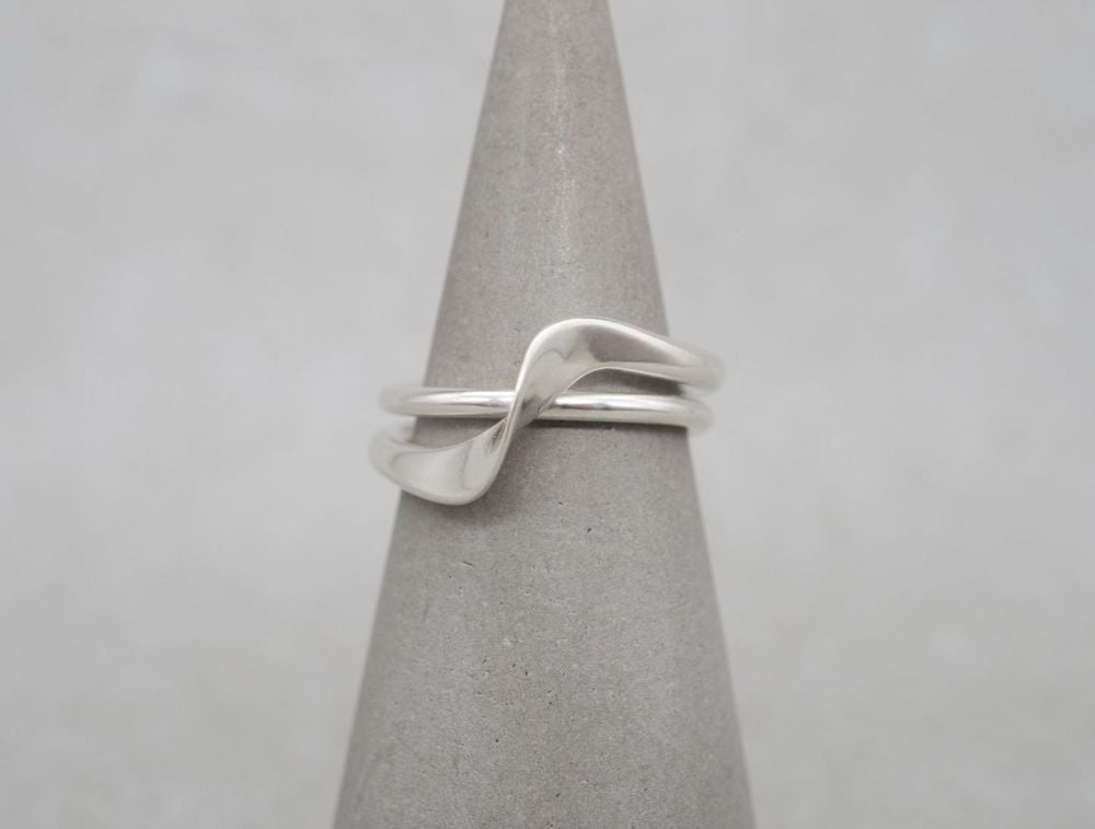 Sterling silver double band effect ring with a twist
