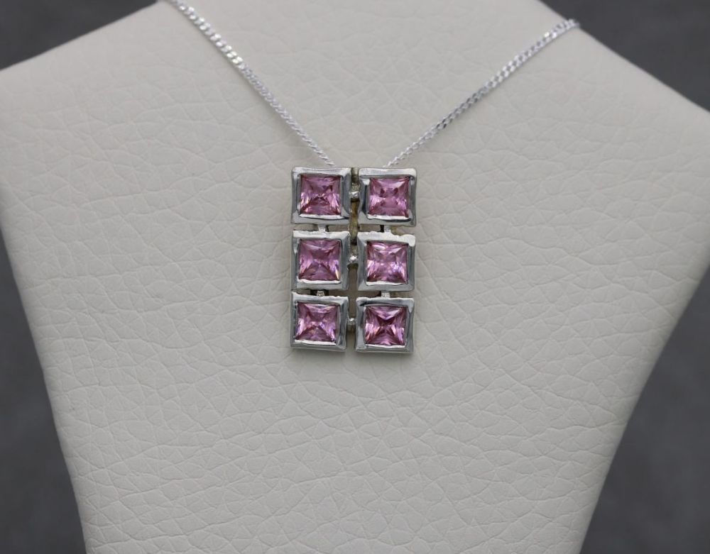 Sterling silver necklace with square pink stones
