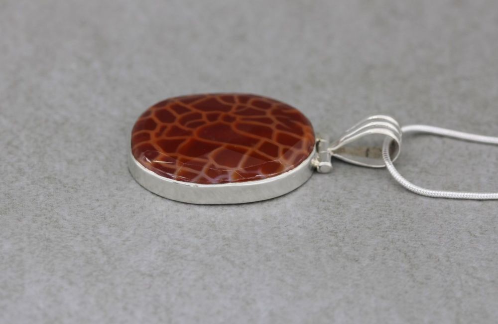 REFURBISHED Sterling silver necklace with a giraffe pattern stone