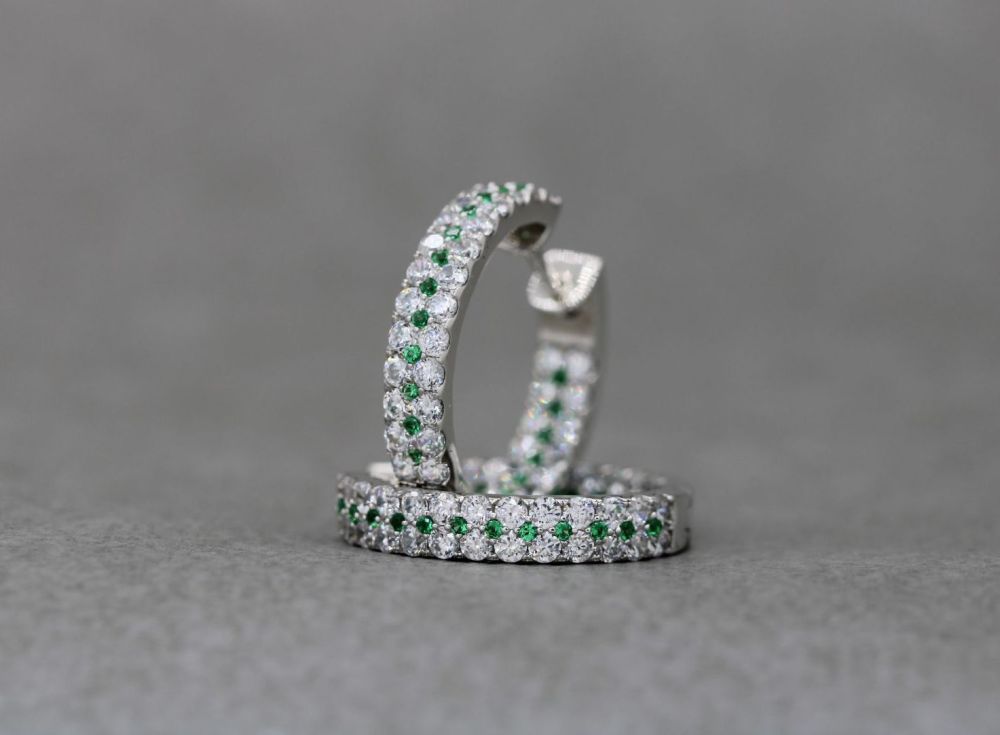 Sterling silver hoop earrings with green & clear stones
