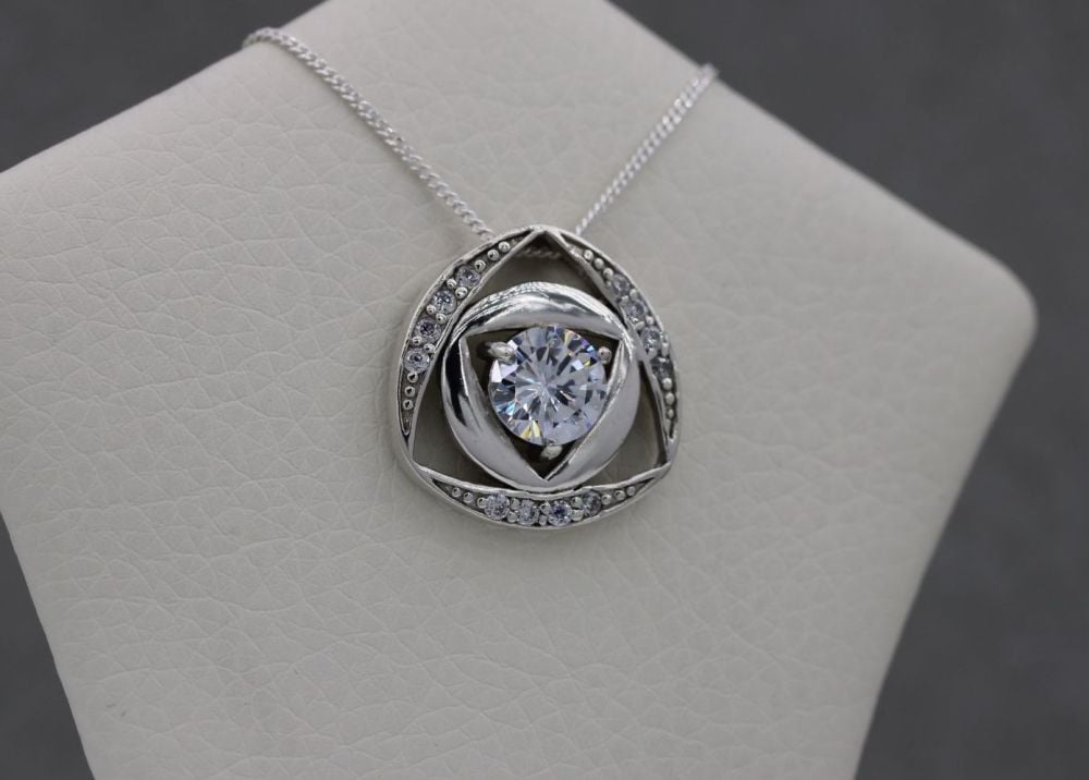 Sterling silver necklace with a fancy stoned pendant