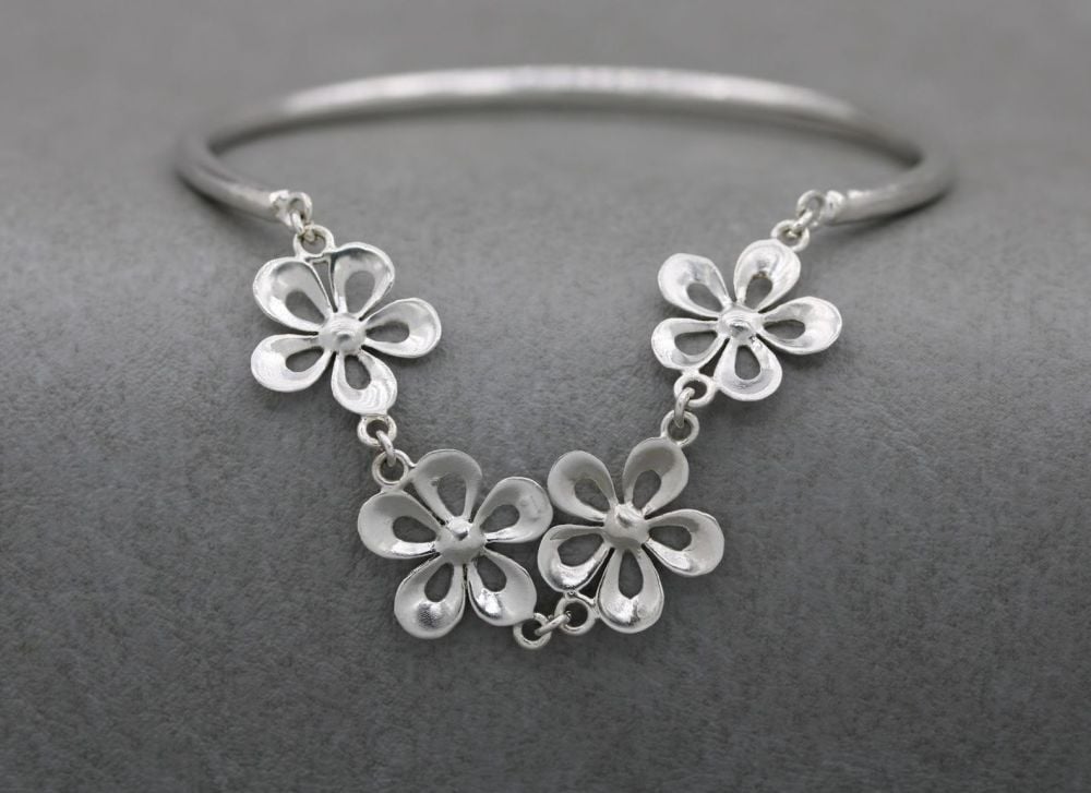 Unusual sterling silver flower bracelet