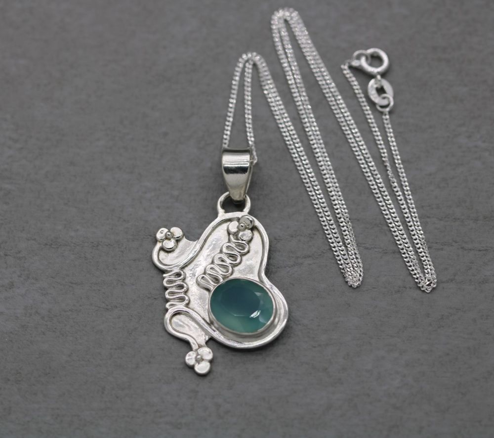 Handmade sterling silver butterfly necklace with a watery blue-green gem