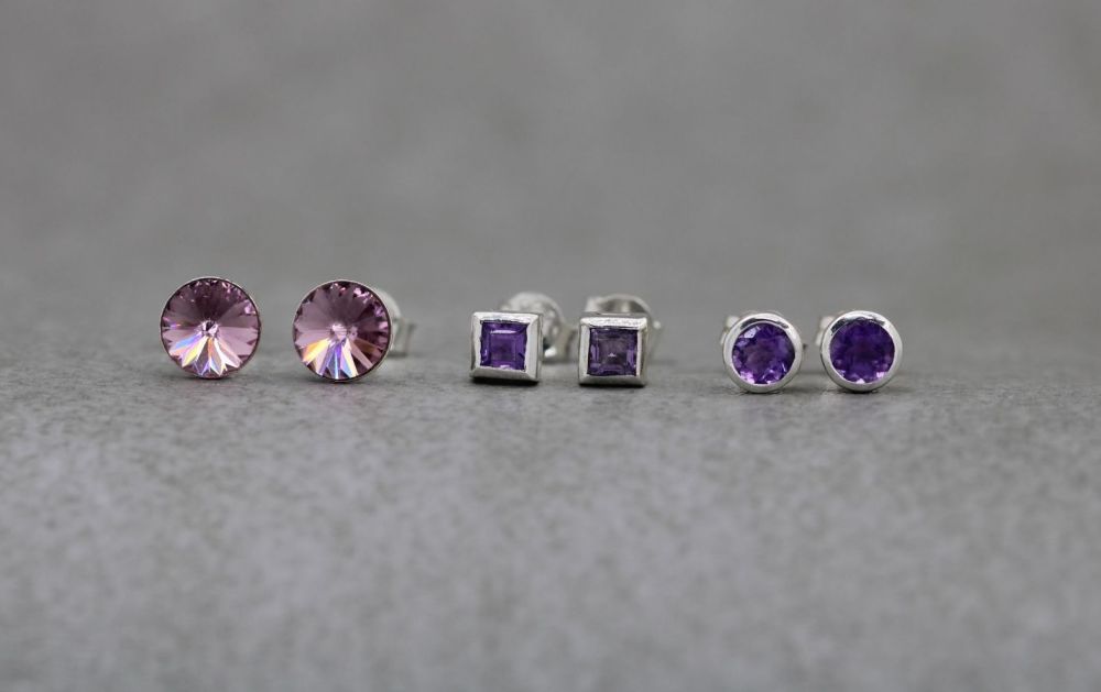 3 x pairs of sterling silver stud earrings; amethyst & crystal